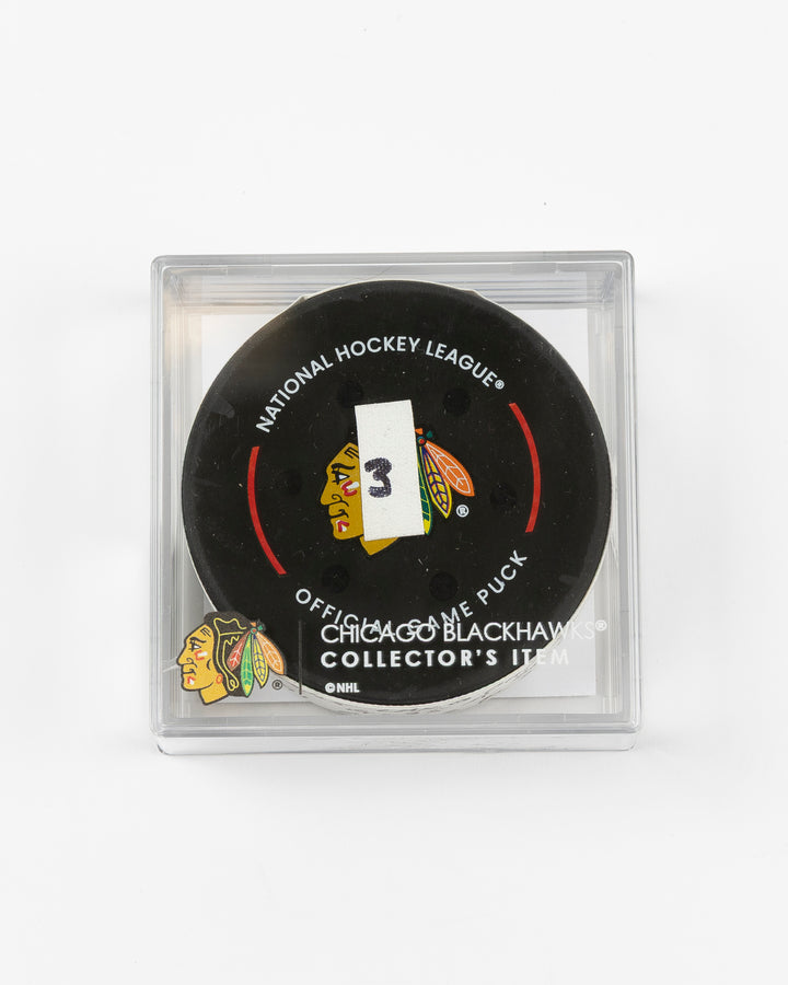 official game used goal puck scored by Chicago Blackhawks player Ilya Mikheyev on 3/3/25 - front lay flat inside case