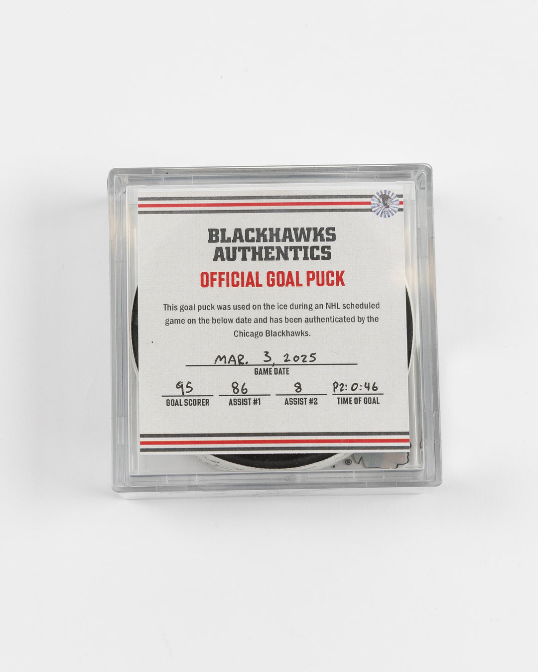 official game used goal puck scored by Chicago Blackhawks player Ilya Mikheyev on 3/3/25 - front lay flat in case and certificate