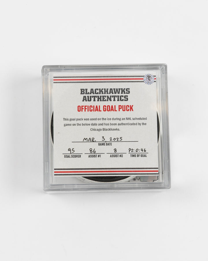 official game used goal puck scored by Chicago Blackhawks player Ilya Mikheyev on 3/3/25 - front lay flat in case and certificate