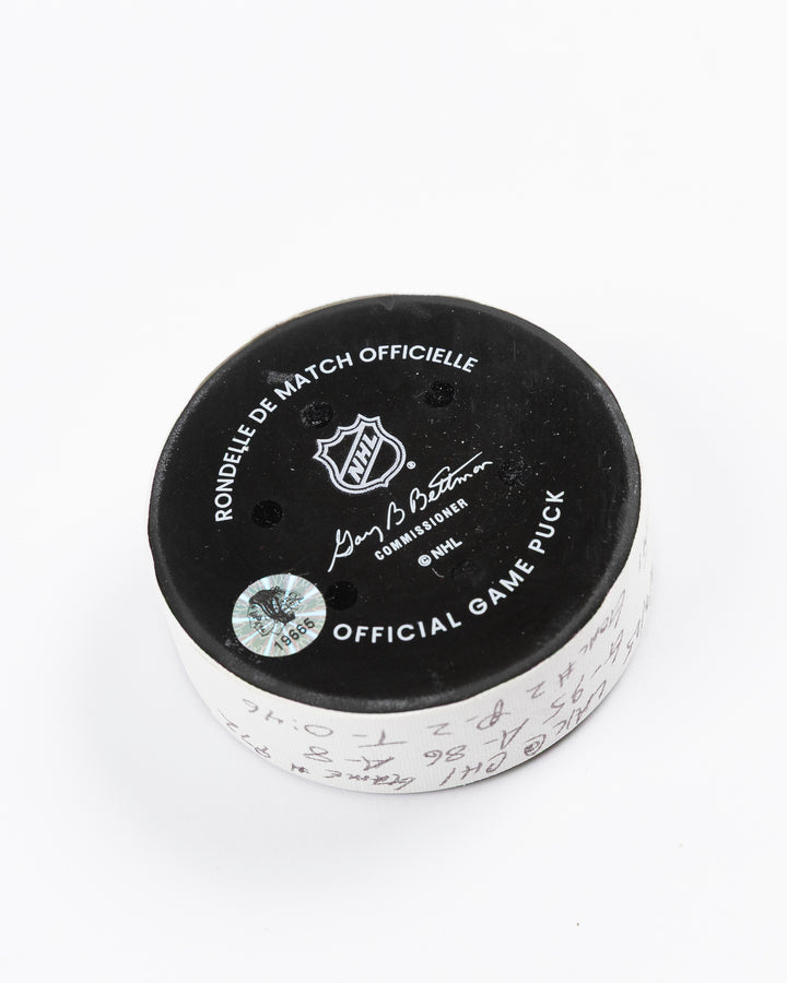 official game used goal puck scored by Chicago Blackhawks player Ilya Mikheyev on 3/3/25 - back angle lay flat