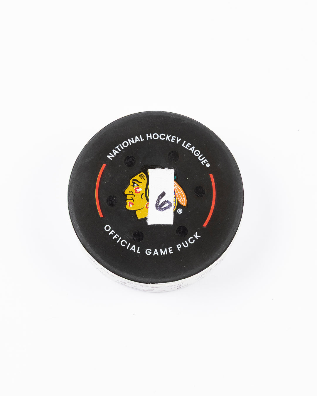 official hockey goal puck scored by Chicago Blackhawks plyer Craig Smith against Ottawa Senators 3/5/25 - front lay flat