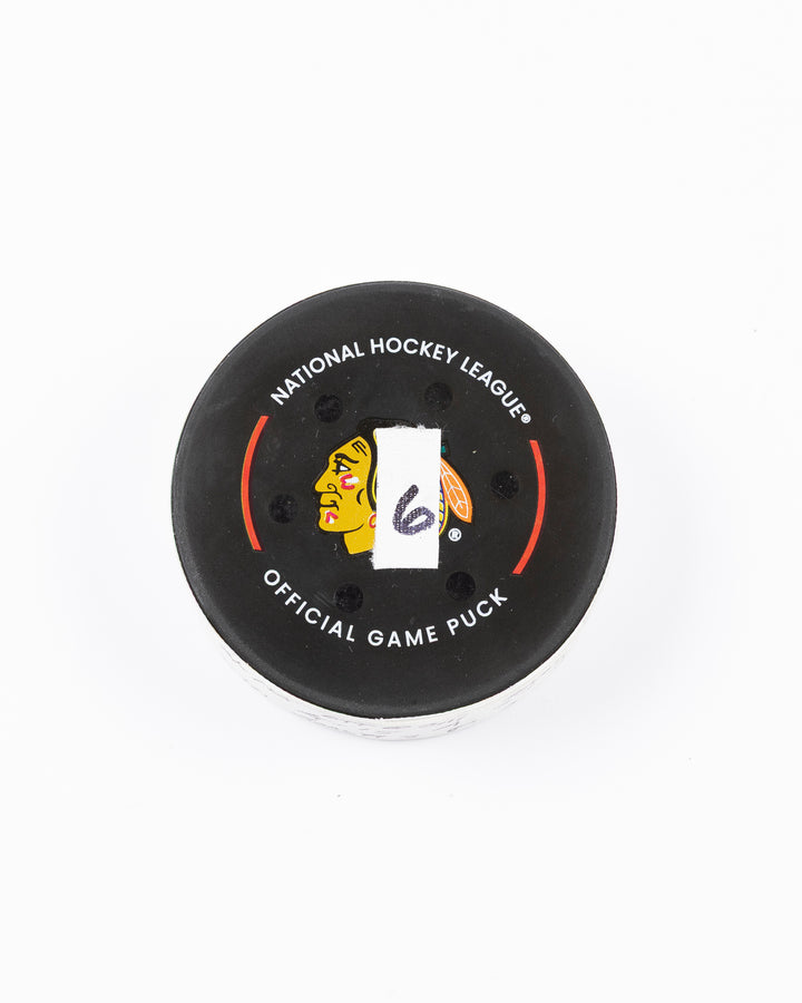 official hockey goal puck scored by Chicago Blackhawks plyer Craig Smith against Ottawa Senators 3/5/25 - front lay flat