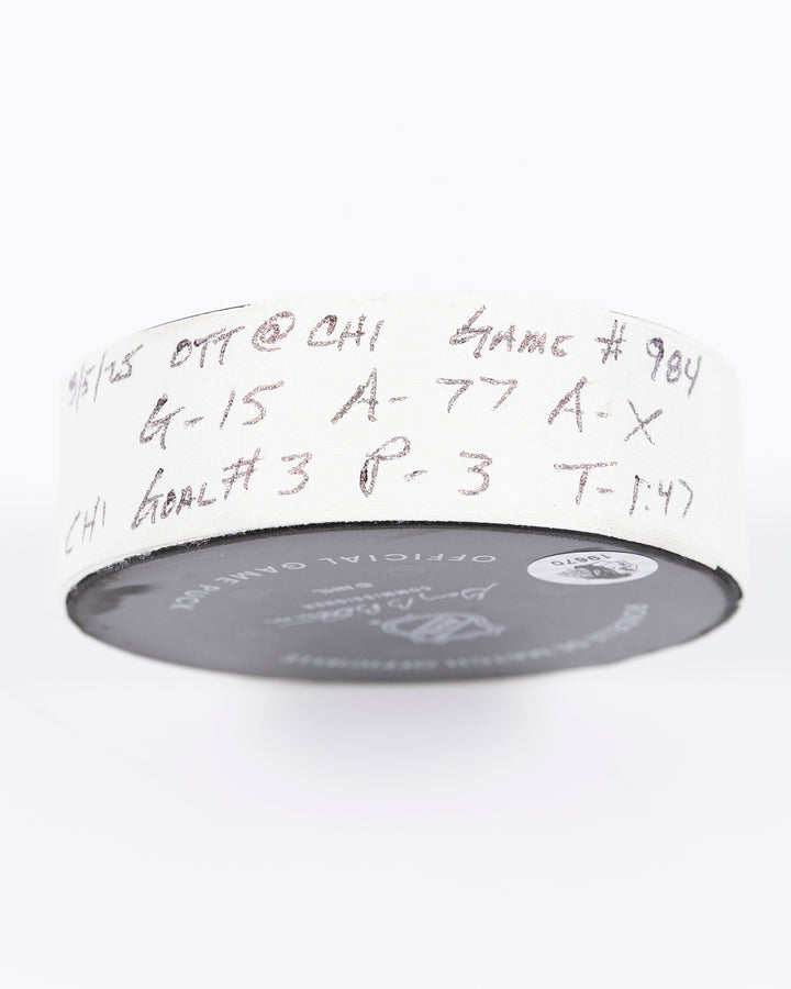 official hockey goal puck scored by Chicago Blackhawks plyer Craig Smith against Ottawa Senators 3/5/25 - tape detail lay flat
