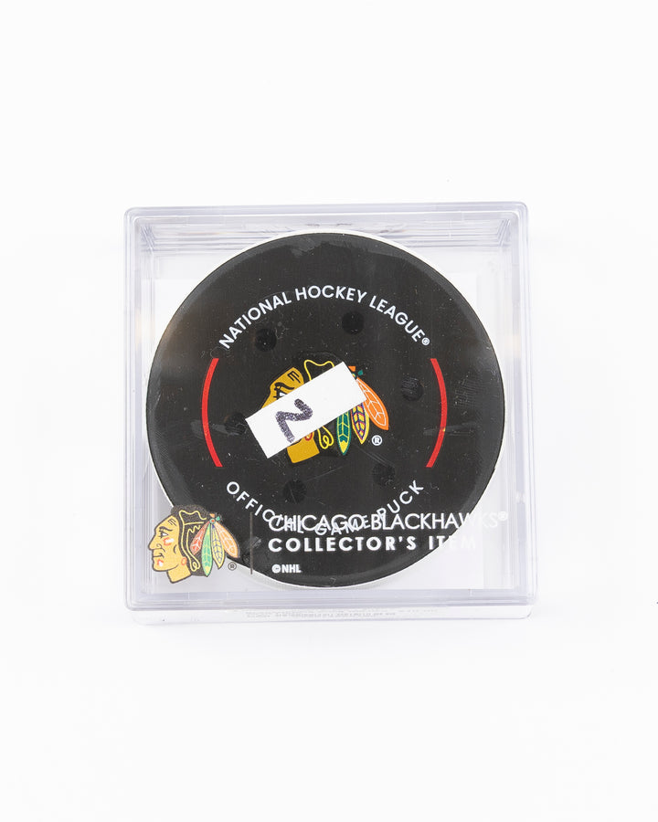 game used hockey goal puck scored by Chicago Blackhawks player Tyler Bertuzzi - front lay flat in case