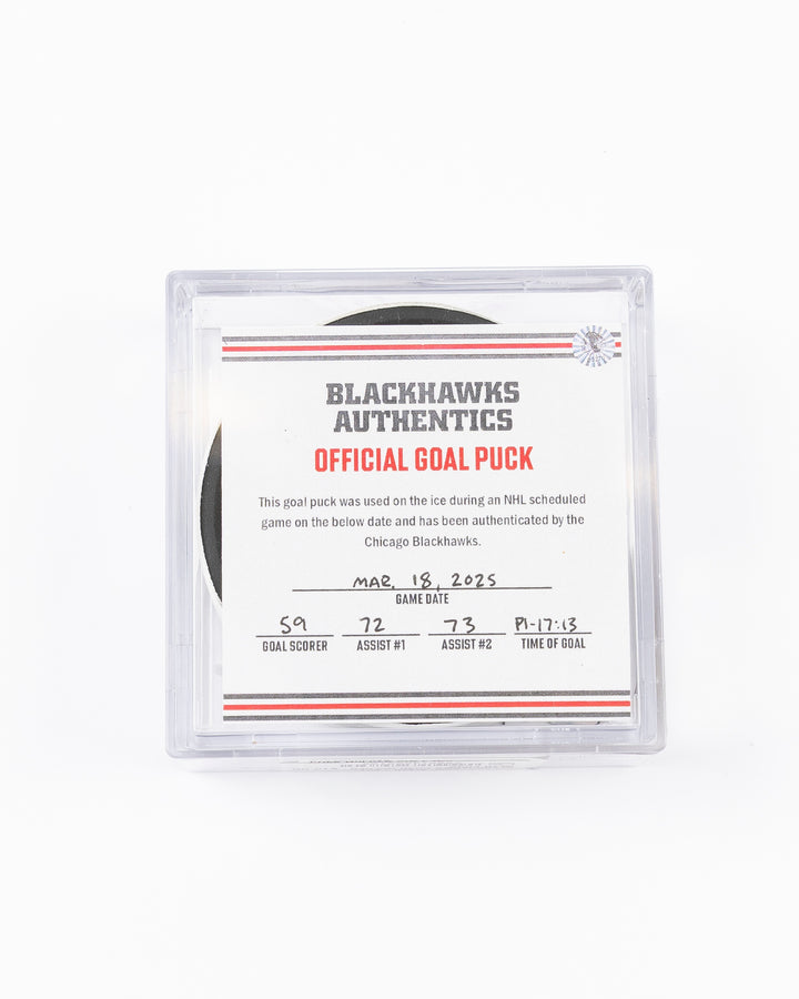 game used hockey goal puck scored by Chicago Blackhawks player Tyler Bertuzzi - front lay flat in case with certificate