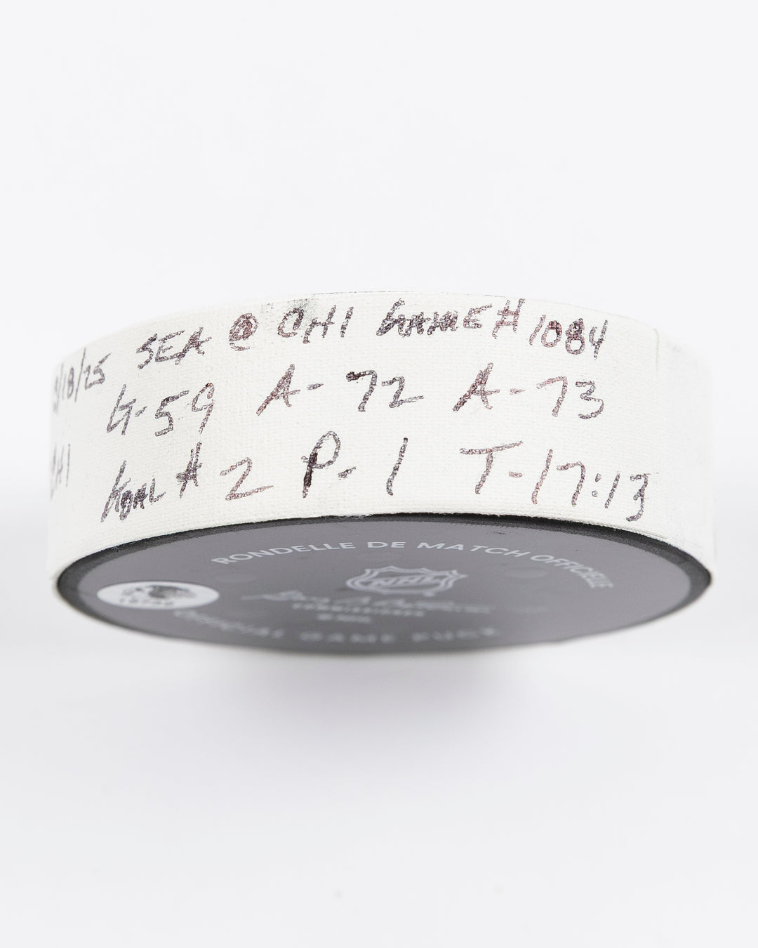 game used hockey goal puck scored by Chicago Blackhawks player Tyler Bertuzzi - tape detail lay flat