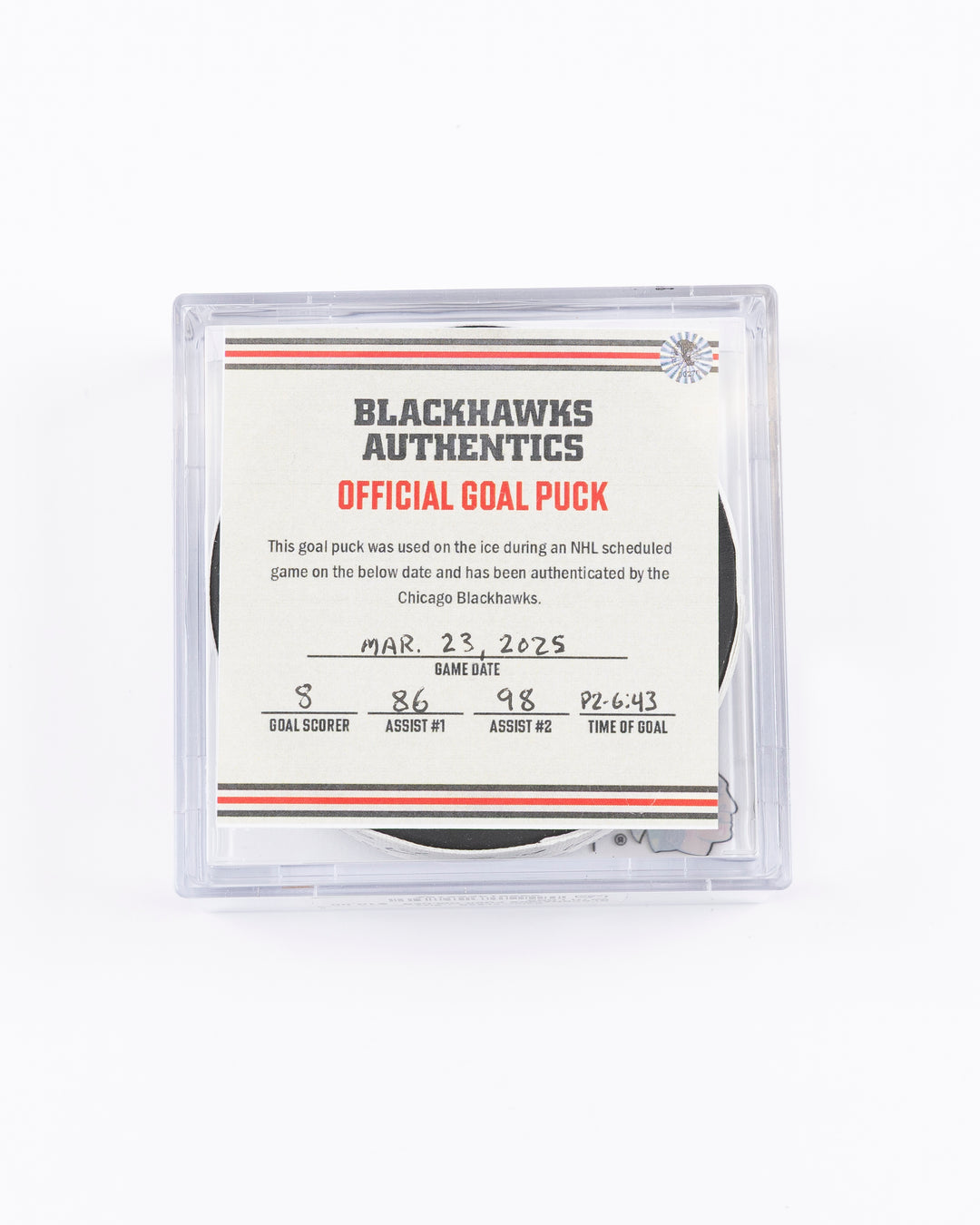 official hockey goal puck scored by Chicago Blackhawks player Ryan Donato 3/23/25 - front lay flat in case with certificate 