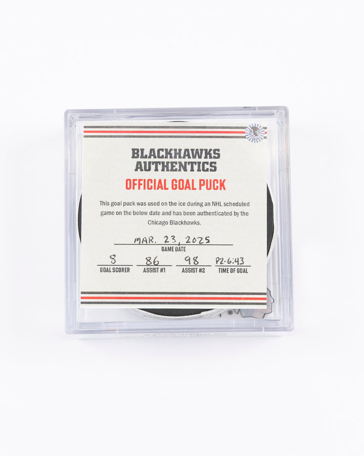 official hockey goal puck scored by Chicago Blackhawks player Ryan Donato 3/23/25 - front lay flat in case with certificate 