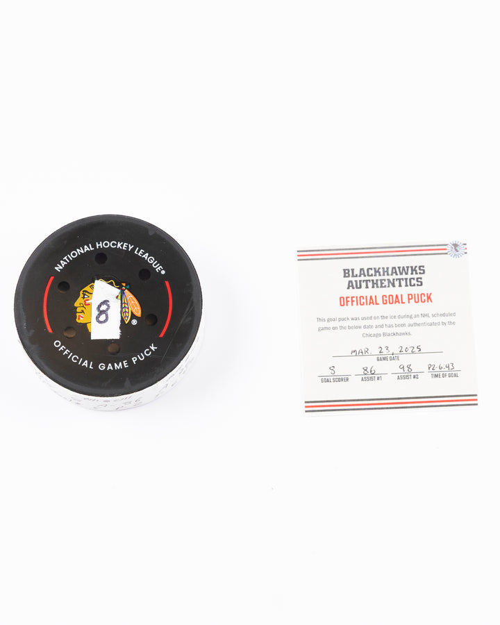 official hockey goal puck scored by Chicago Blackhawks player Ryan Donato 3/23/25 - front lay flat puck and certificate