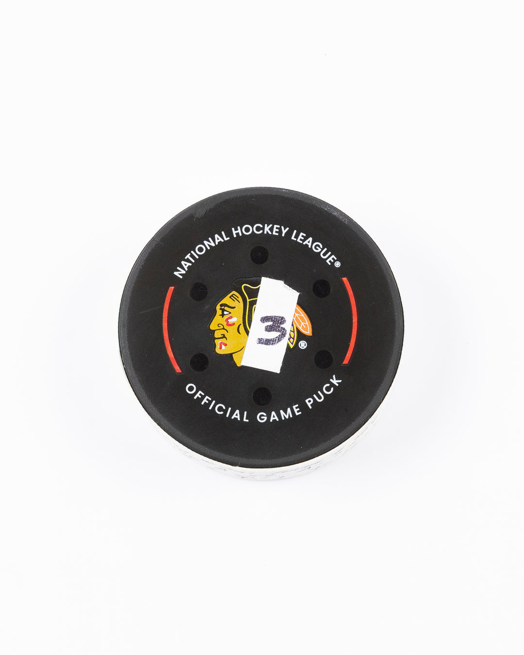 official game used hockey goal puck scored by Chicago Blackhawks player Teuvo Teravainen - front lay flat