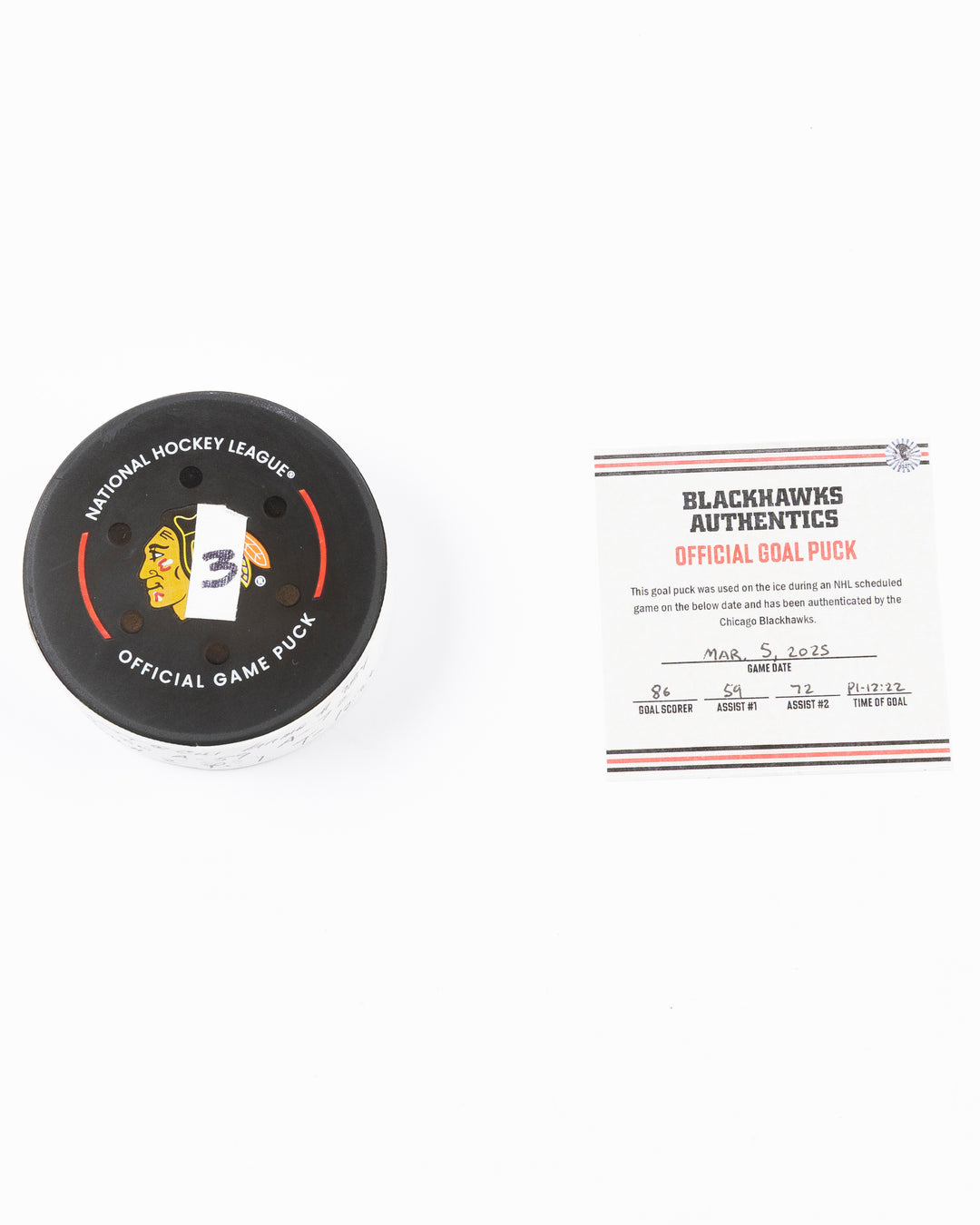 official game used hockey goal puck scored by Chicago Blackhawks player Teuvo Teravainen - front lay flat of puck and certificate