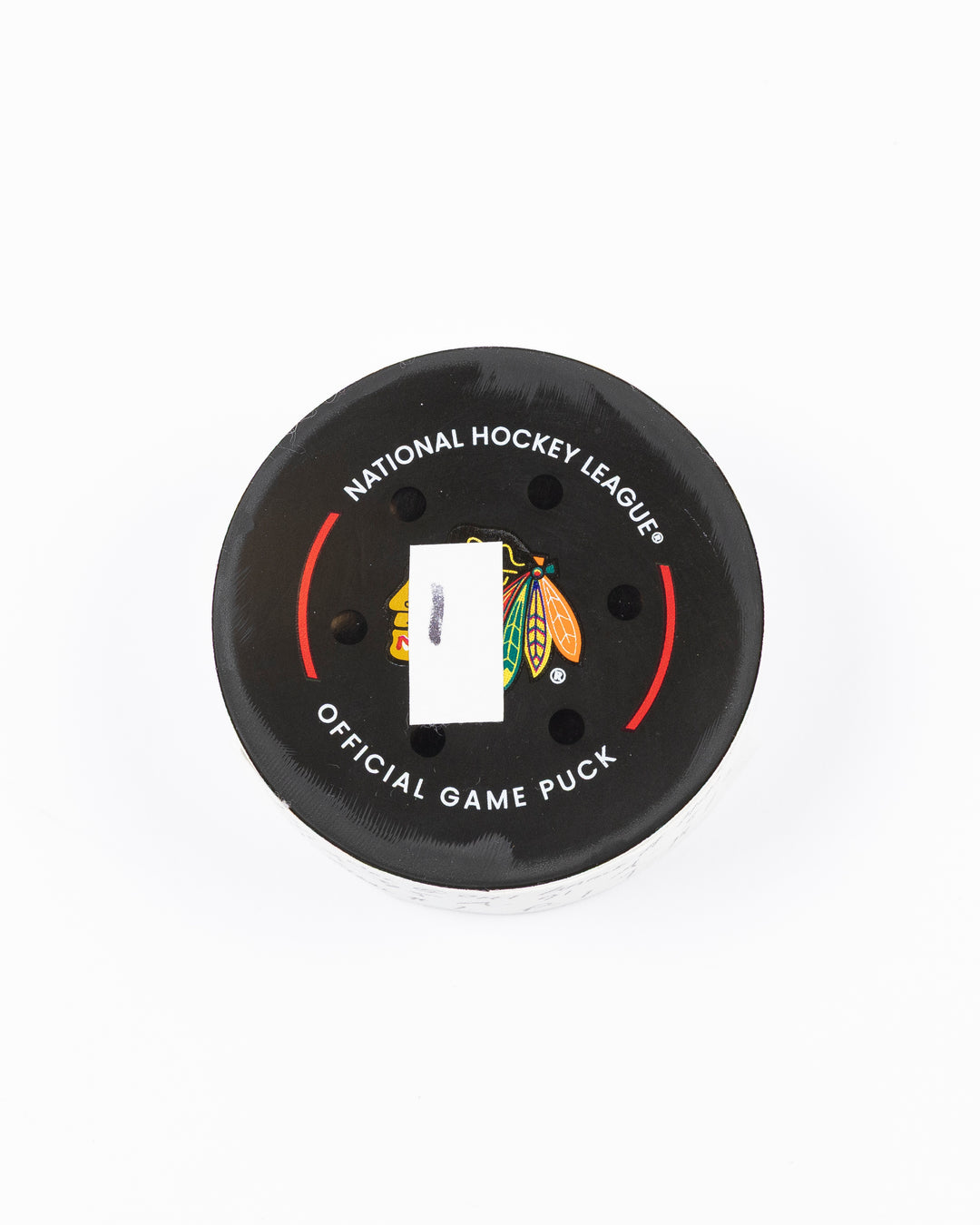 official hockey goal puck scored by Chicago Blackhawks player Ilya Mikheyev on 4/2/25 - front lay flat