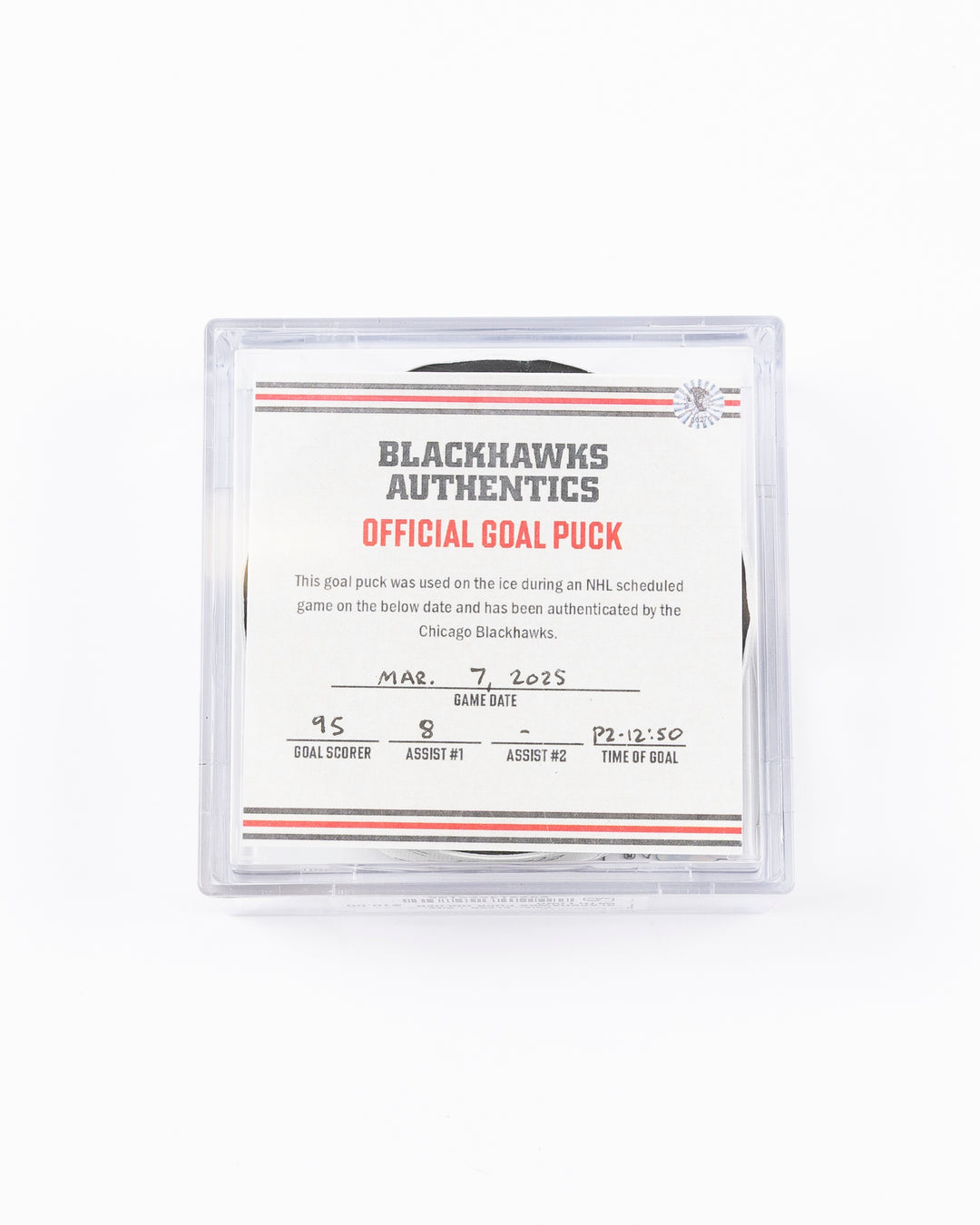 official game used hockey goal puck scored by Chicago Blackhawks player Ilya Mikheyev - front lay flat in case with certificate