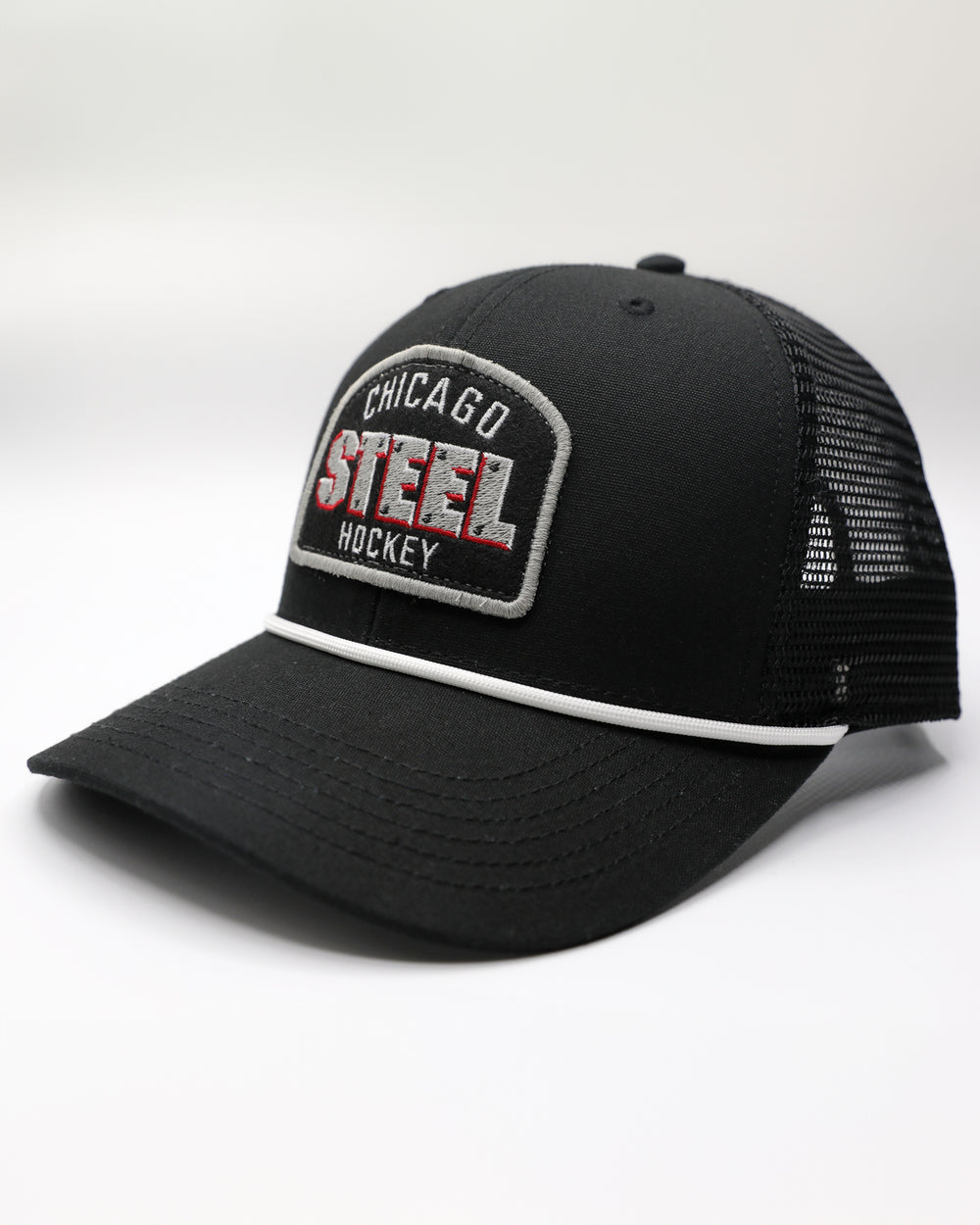 black rope trucker cap with Chicago Steel hockey patch embroidered on front - left angle lay flat