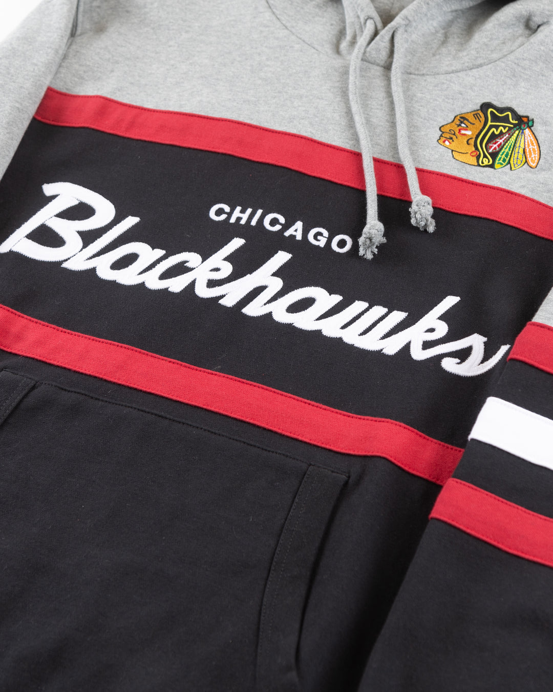 Mitchell & Ness grey and black hoodie with Chicago Blackhawks wordmark and primary logo on front - detail front lay flat