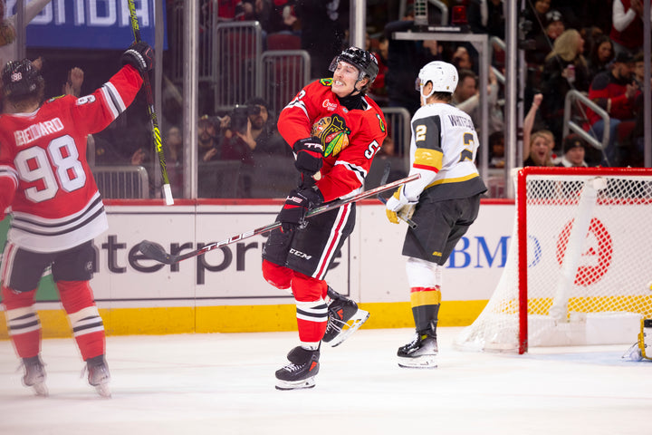Chicago Blackhawks player Tyler Bertuzzi scoring against Vegas Golden Knights on January 18, 2025