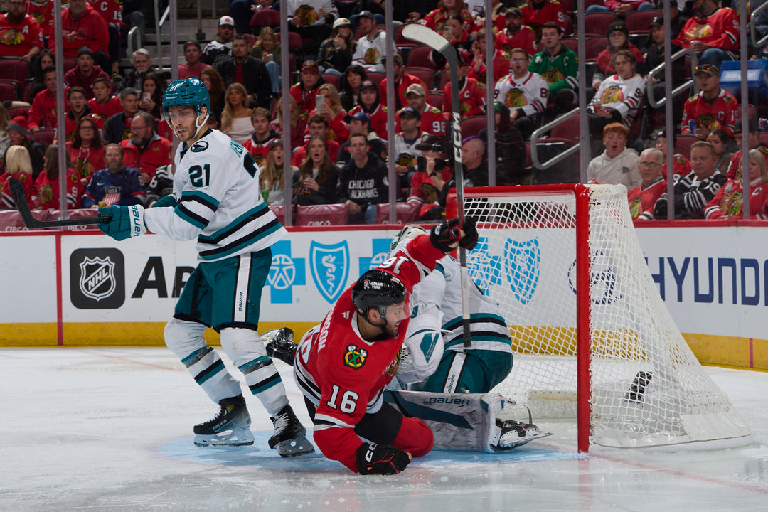 Chicago Blackhawks player Jason Dickinson scoring during game on October 17, 2024