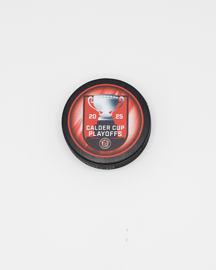 black hockey puck with Rockford IceHogs logo with 2025 Calder Cup Playoffs graphic on front - front lay flat