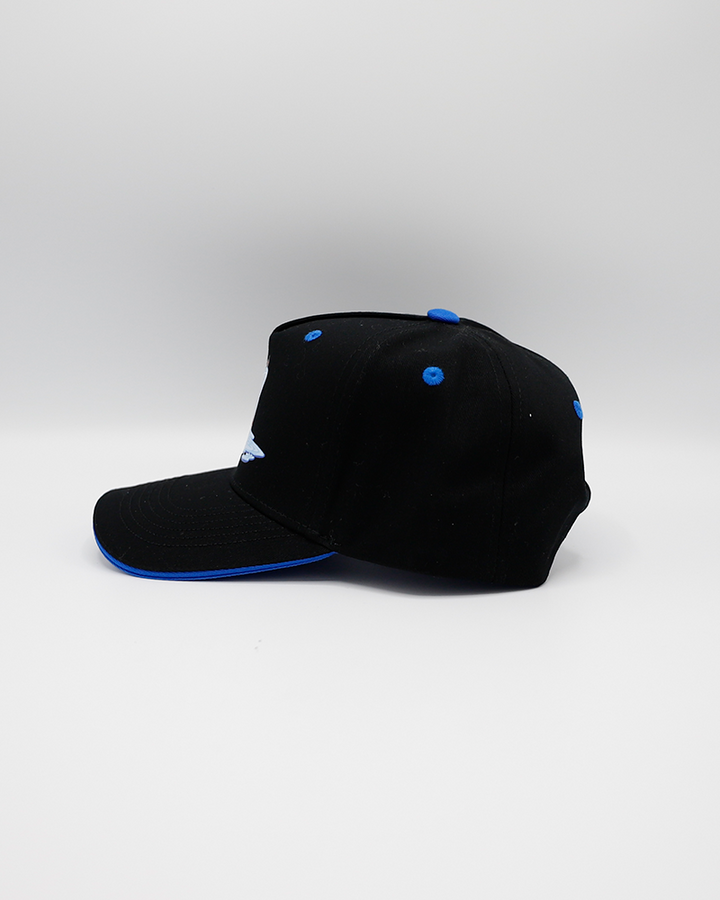 black adjustable hat part of local artist series with Rockford IceHogs inspired design created by Chris Geebus - left side lay flat