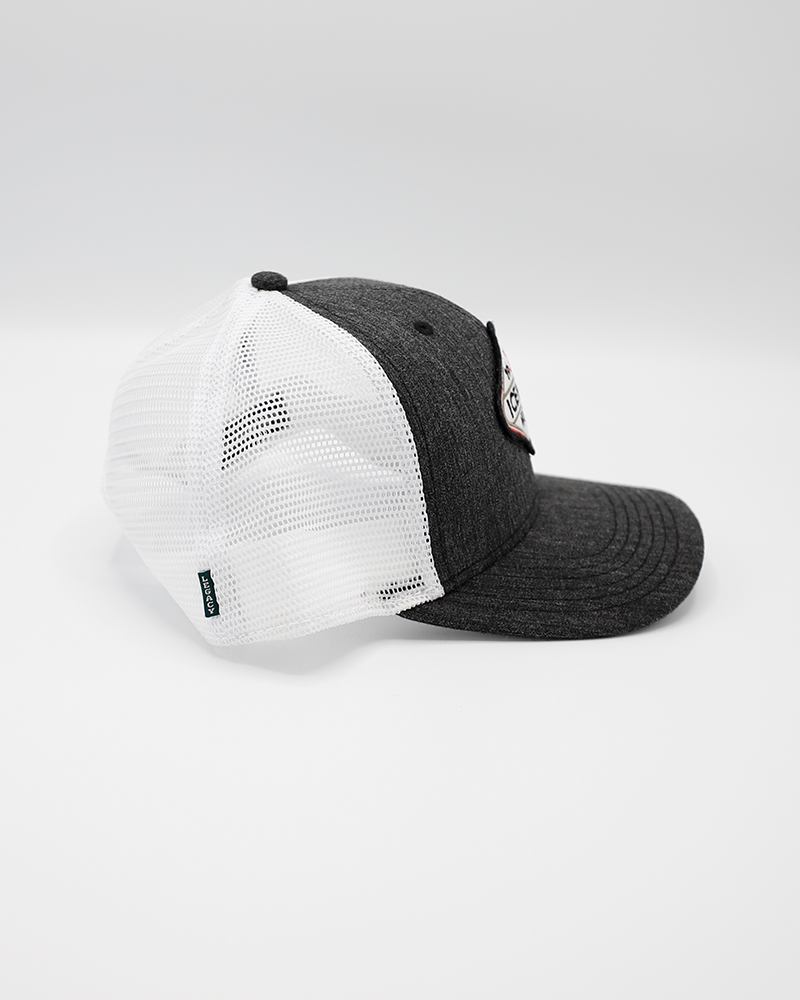 black and white Legacy trucker hat with 1999 IceHogs Hockey patch on front - right side lay flat