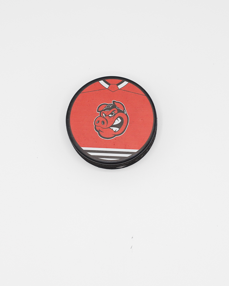 black hockey puck with Rockford IceHogs red jersey and Hammy graphic design on front - front lay flat