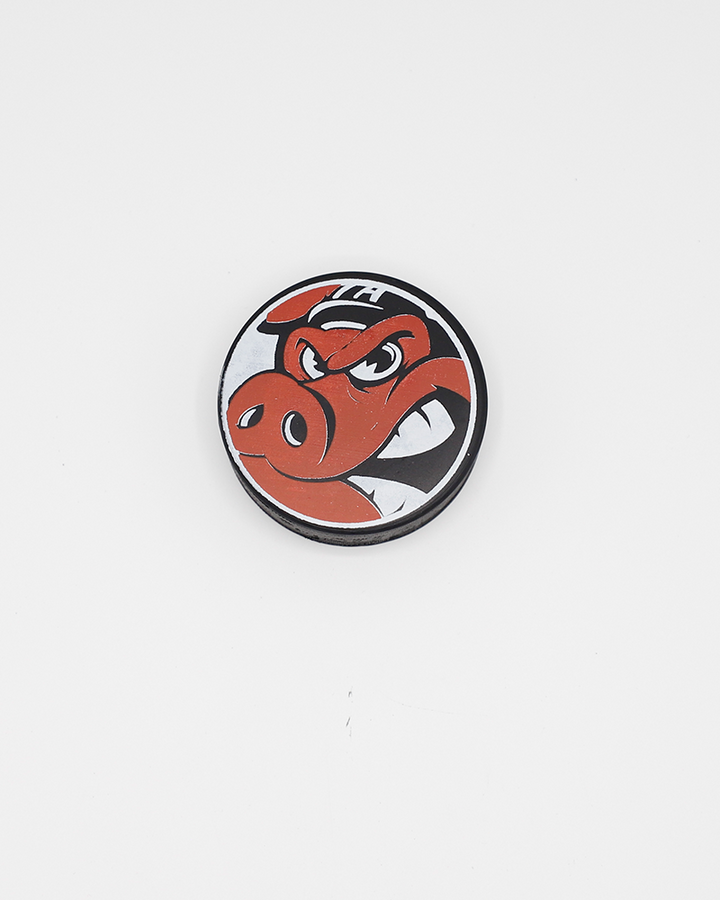 black hockey puck with close up Rockford IceHogs Hammy graphic on front - front lay flat