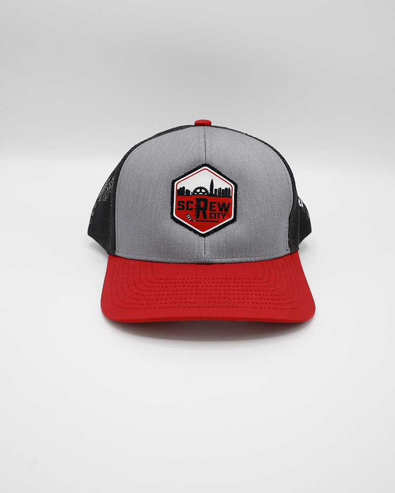 black grey and red trucker hat with Rockford IceHogs Screw City hexagon logo patch on front - front lay flat