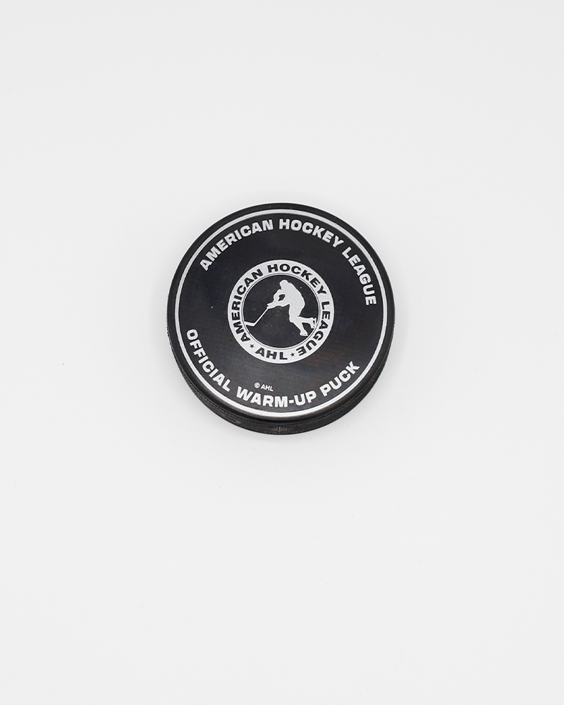 black hockey puck with green accents and green version of Rockford IceHogs mascot Hammy on front - back lay flat