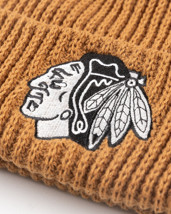 brown CCM knit hat with Chicago Blackhawks tonal logo embroidered on front cuff - detail lay flat