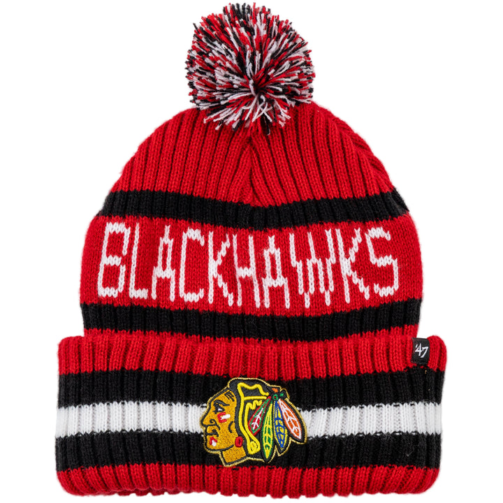 Red and black knit beanie with pom-pom and Blackhawks logo on a white background