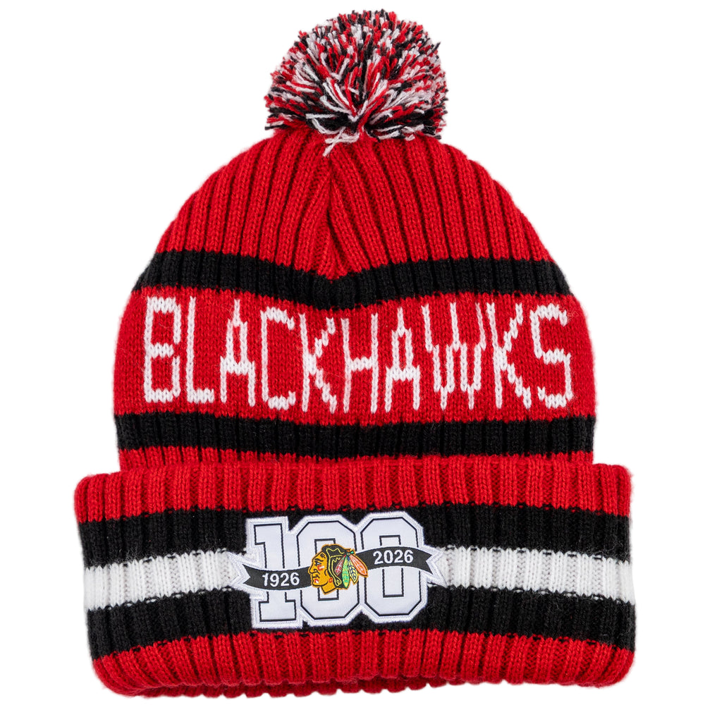 Red and black knit beanie with 'Blackhawks' and centennial logo on a white background