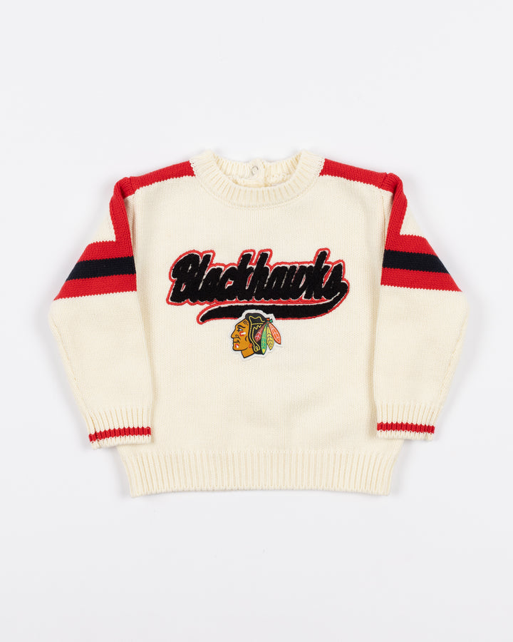 white WEAR baby sweater with Blackhawks embroidered wordmark and primary logo on front - front lay flat