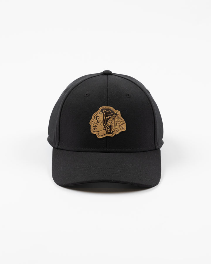 black Sportiqe adjustable hat with leather patch of Chicago Blackhawks primary logo on front - front lay flat