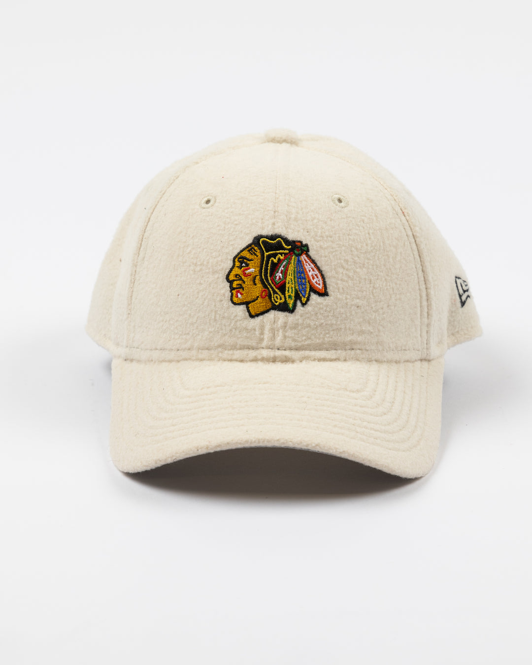 white sherpa New Era adjustable cap with Chicago Blackhawks primary logo embroidered on front - front lay flat