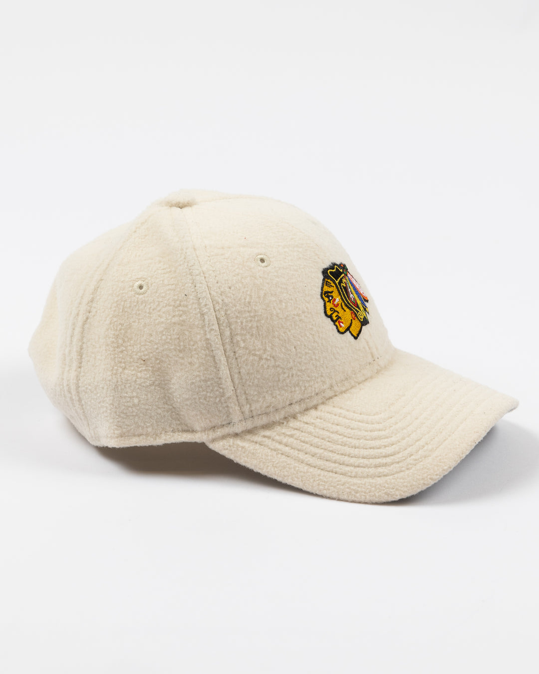 white sherpa New Era adjustable cap with Chicago Blackhawks primary logo embroidered on front - right side lay flat