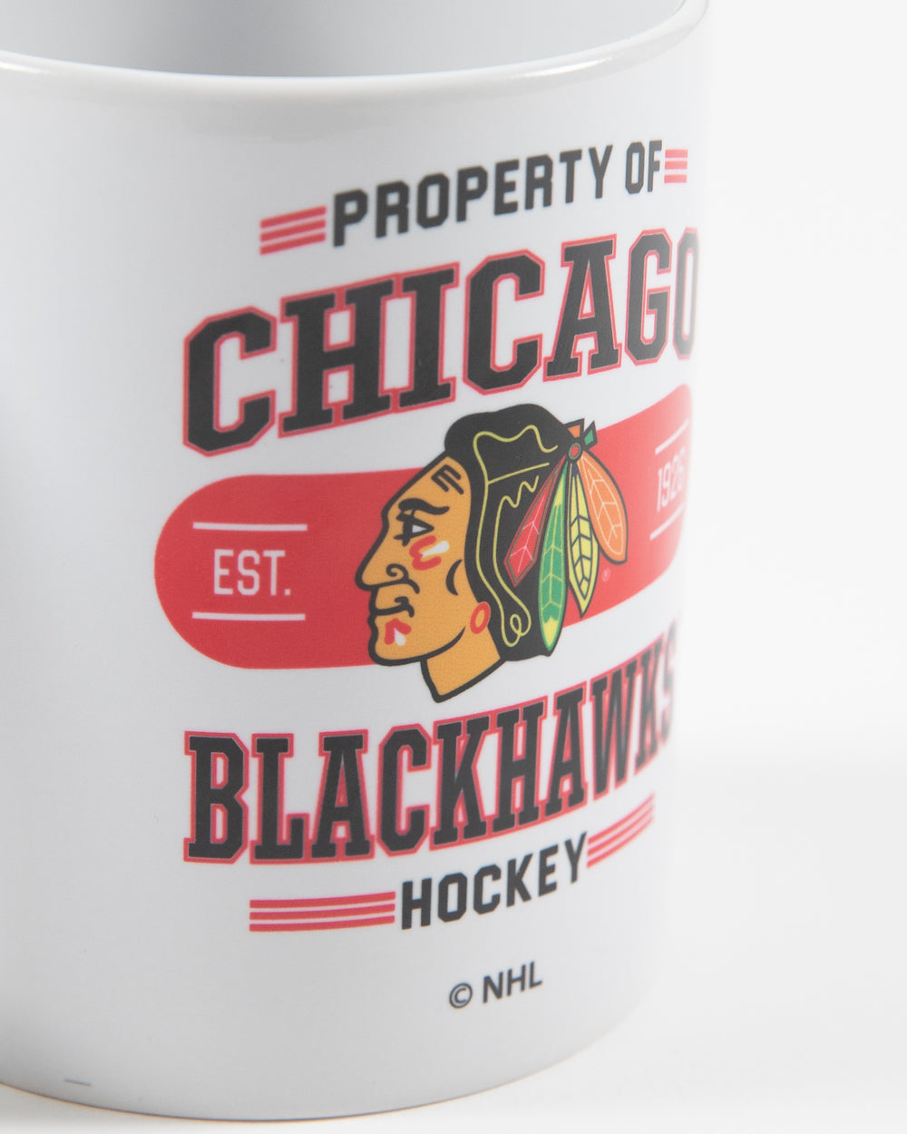 white Chicago Blackhawks property of mug with wordmark graphic across front - detail lay flat