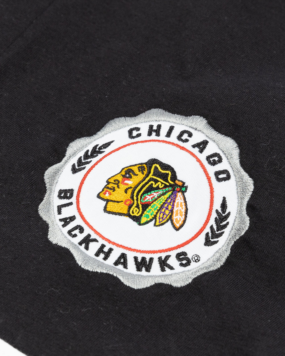 black white and grey striped Champion ruby shirt with Chicago Blackhawks patch on left chest - detail lay flat