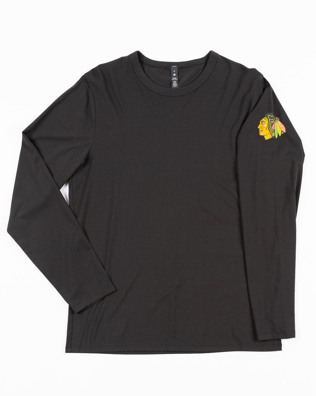 black lululemonn long sleeve tee with Chicago Blackhawks primary logo on left shoulder - front lay flat