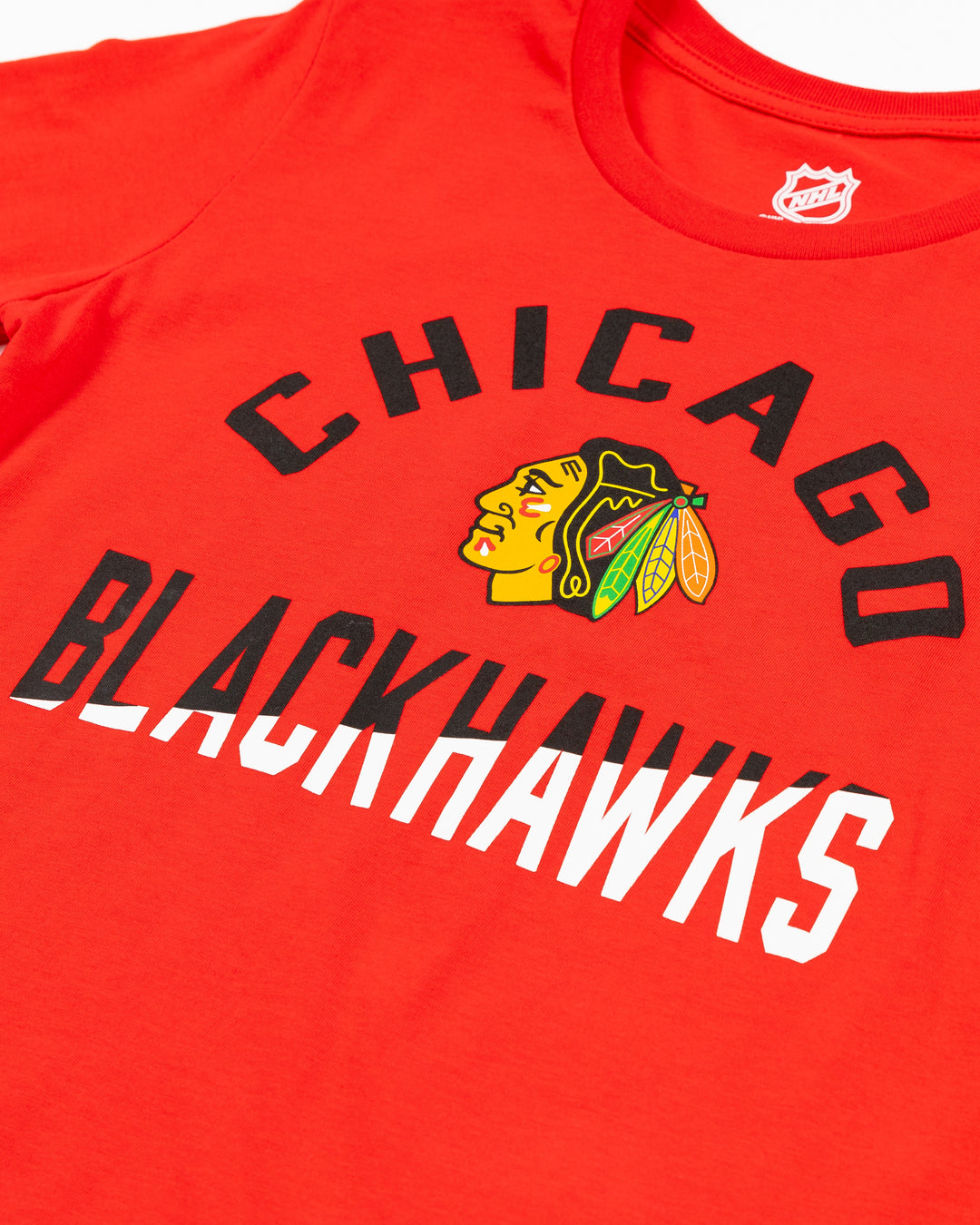 red youth tee with Chicago Blackhawks wordmark graphic surrounding primary logo - detail lay flat