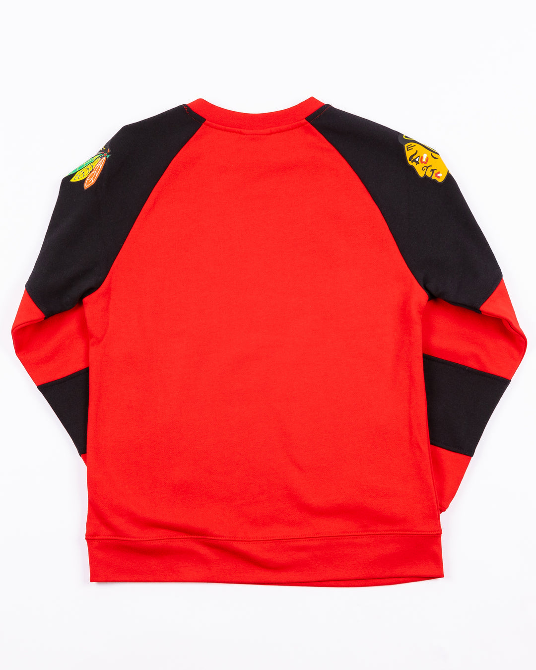 red and black youth crewneck with Chicago Blackhawks wordmark across front and primary logo on both shoulders - back lay flat