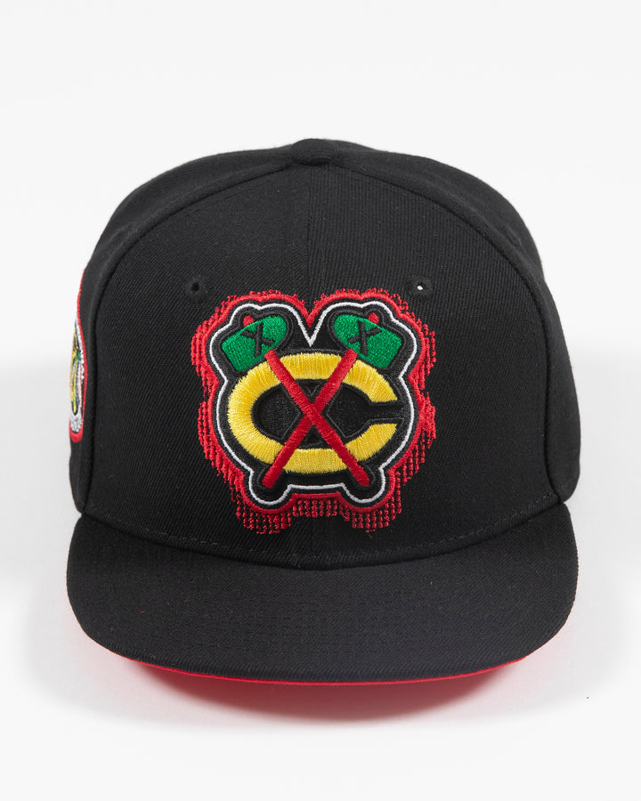 black Mitchell & Ness snapback with Chicago Blackhawks secondary logo embroidered on front and primary logo patch embroidered on right side - front lay flat 