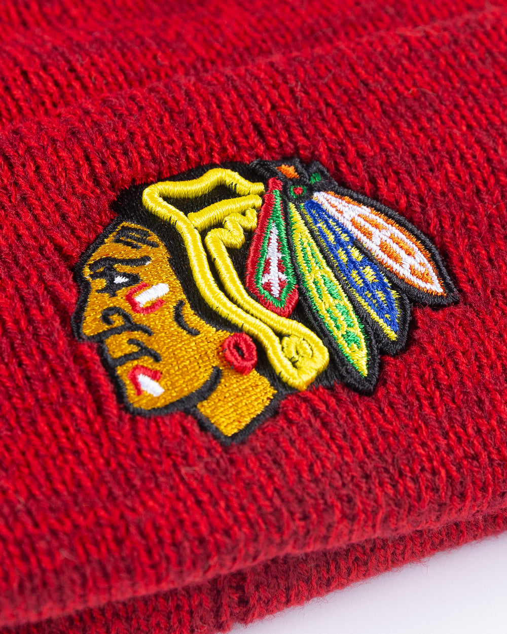 red '47 brand knit beanie with Chicago Blackhawks primary logo embroidered on front - detail lay flat