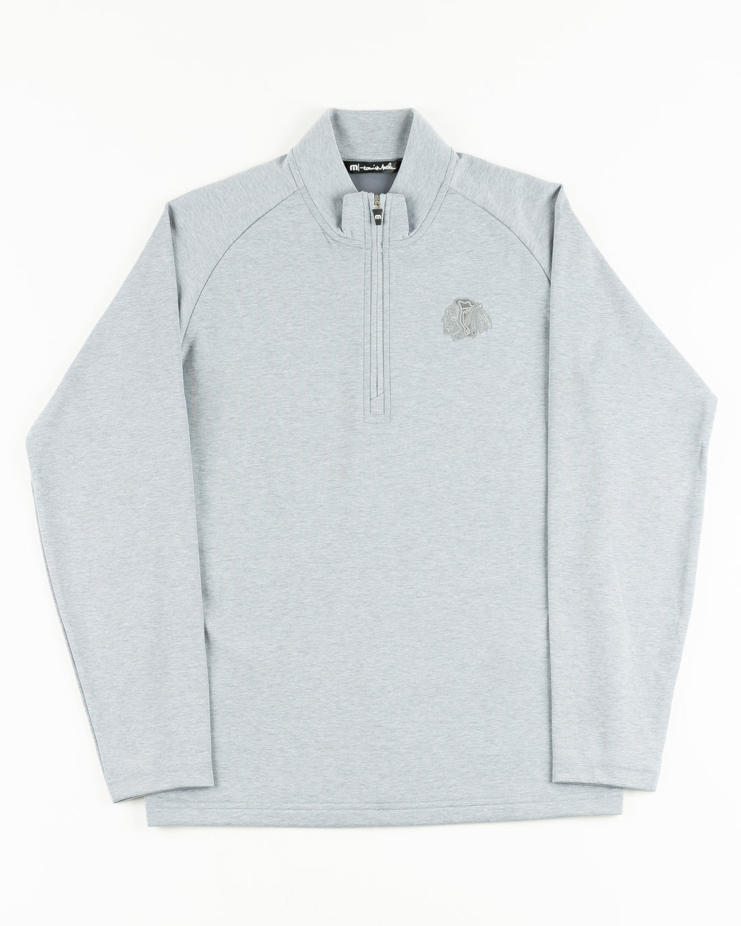 heather grey TravisMathew quarter zip with Chicago Blackhawks primary logo on left chest - front lay flat