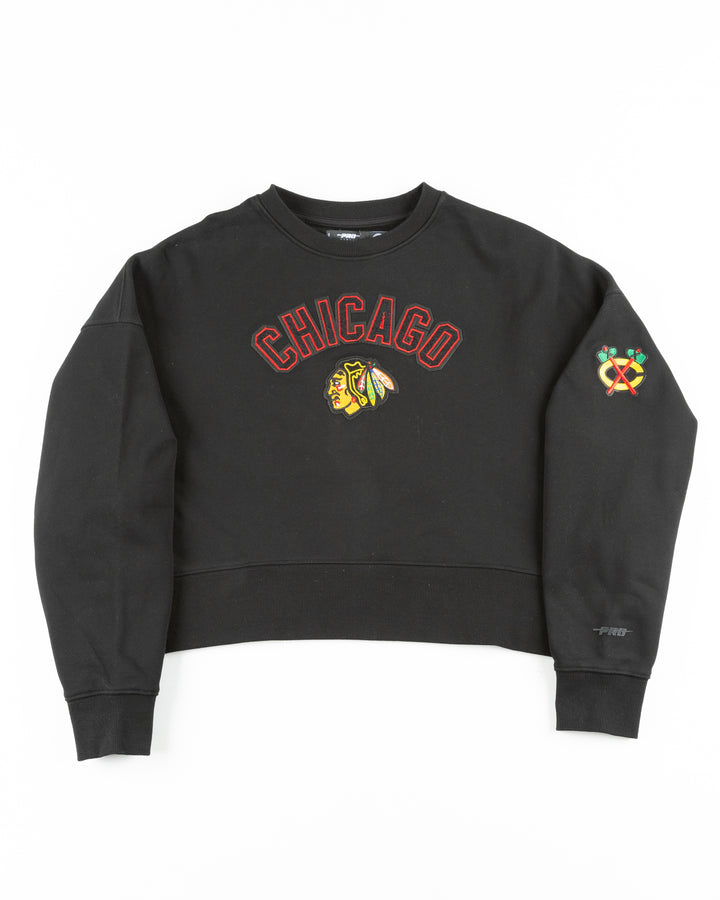 black cropped Pro Standard crewneck with embroidered Chicago Blackhawks patches on chest and shoulder - front lay flat