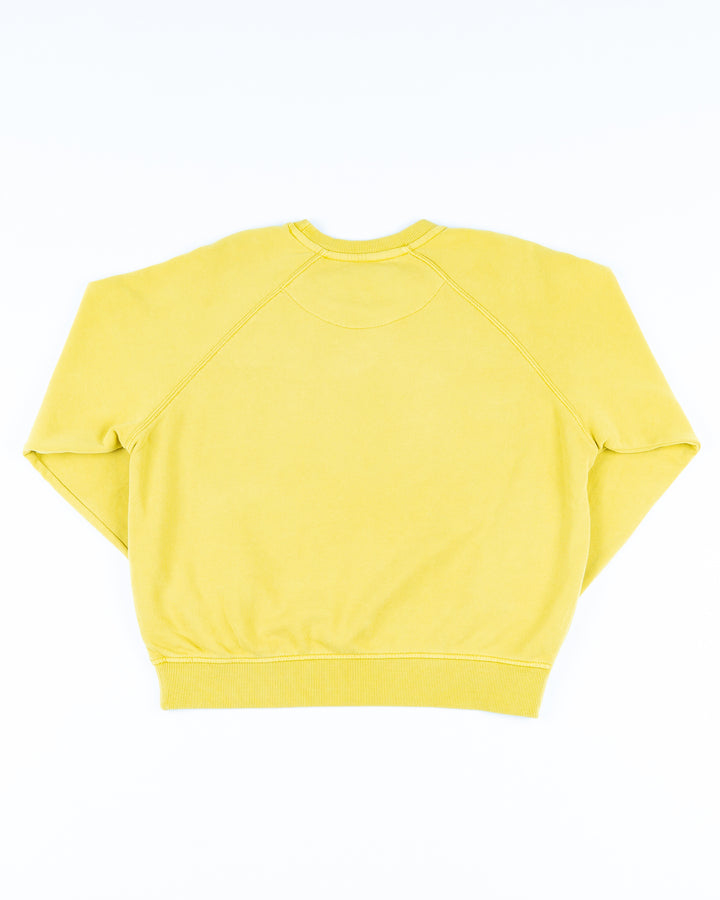 yellow Sportiqe ladies crewneck with Chicago Blackhawks secondary logo on front - back lay flat