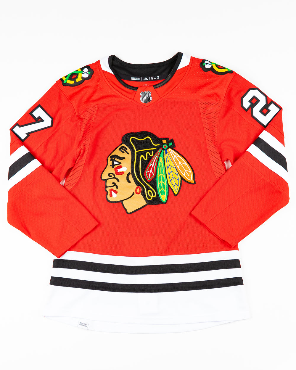 red adidas Chicago Blackhawks jersey with Lukas Reichel name and number stitched - front lay flat