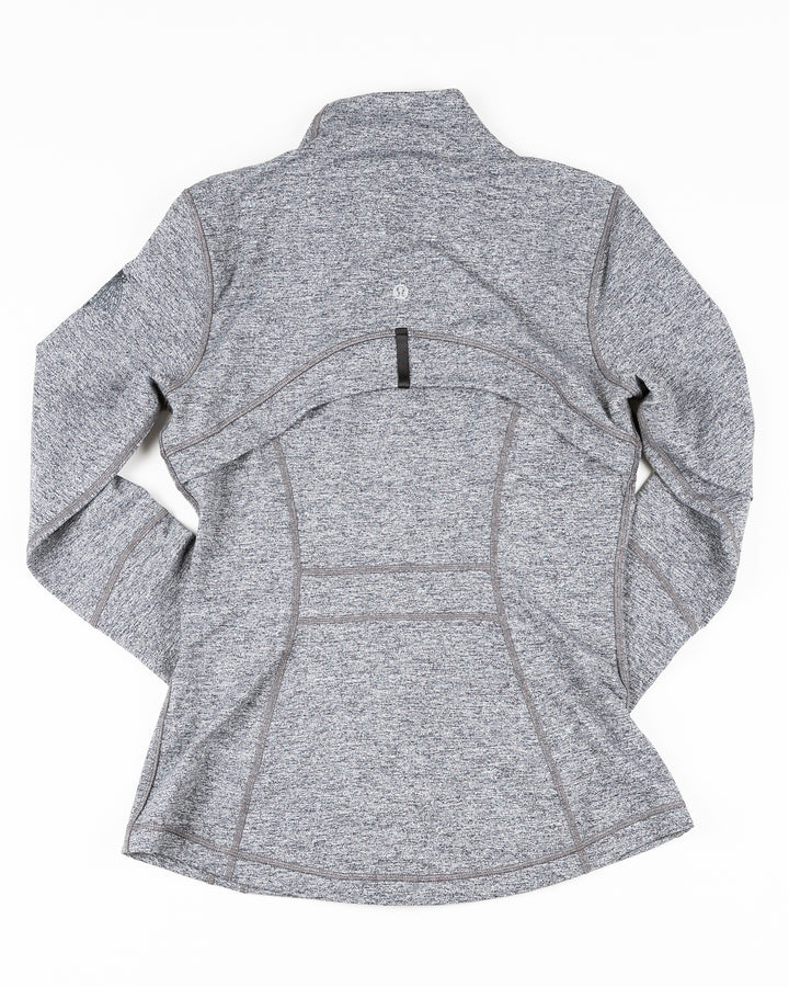 grey lululemon zip up women's jacket with tonal Chicago Blackhawks primary logo printed on left shoulder - back lay flat