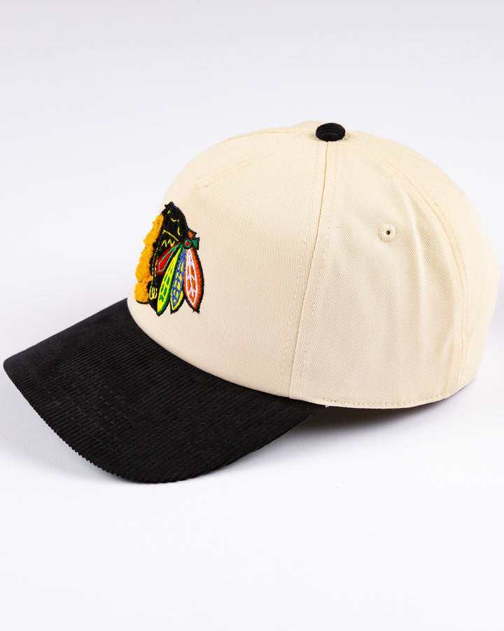 American Needle two tone snapback with chenile primary logo - left angle lay flat