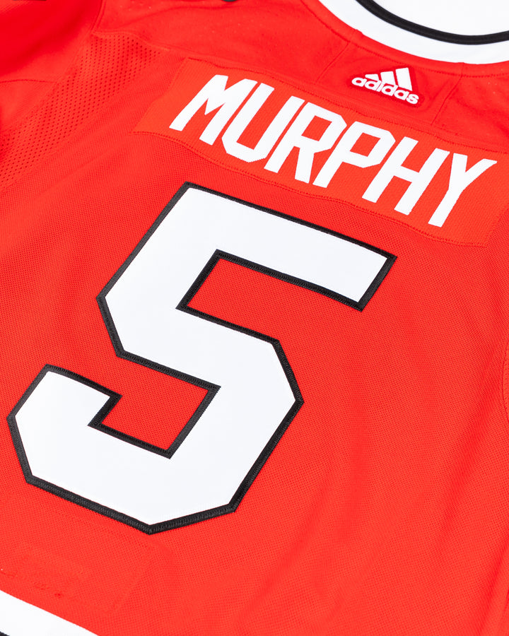 red adidas Chicago Blackhawks jersey with Connor Murphy name and number stitched - back detail lay flat