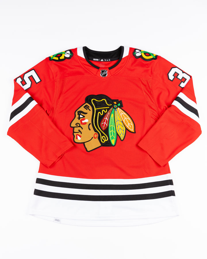 adidas Chicago Blackhawks home jersey with Tony Esposito name and number stitched - front lay flat